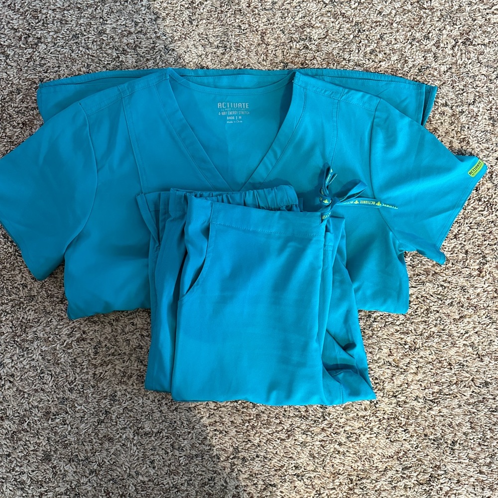 Med Couture Activate scrubs. Medium top, small TALL pants